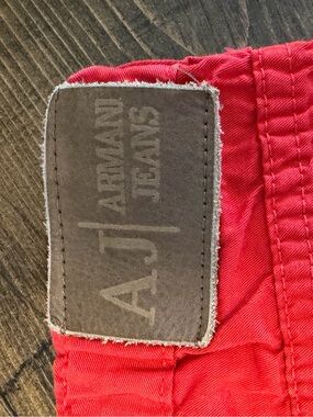 Bright Red Jeans with Leather Patch and Metal Logo